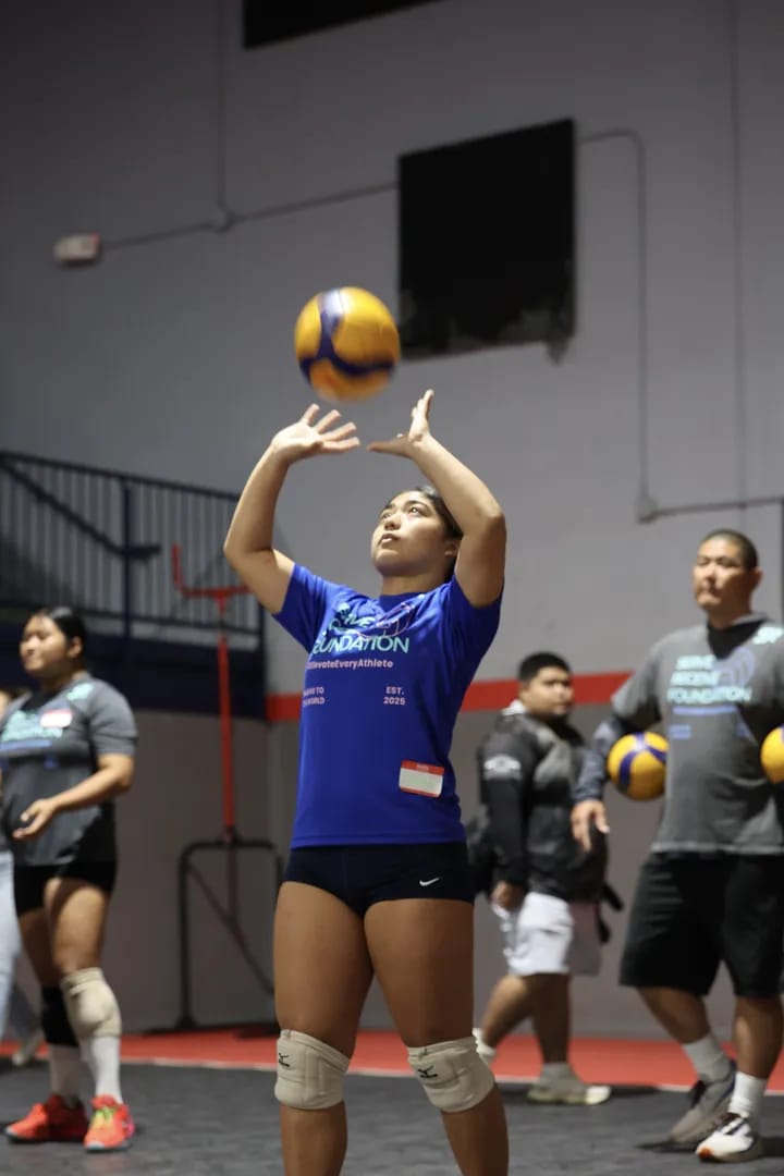 A clinic attendee engaged in volleyball training at the SRF Founding Clinic